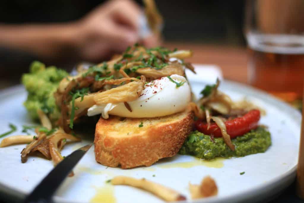 fancy pub meal with eggs on toast