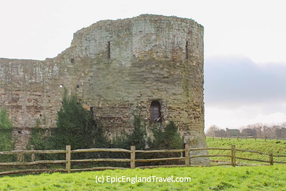 One of the four imposing towers of Pevensey Castle