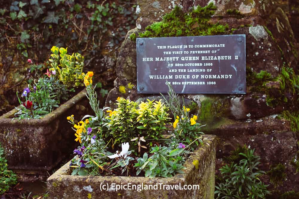 A plaque at Pevensey Castle commemorating the arrival of William the Conqueror and Queen Elizabeth II 900 years later